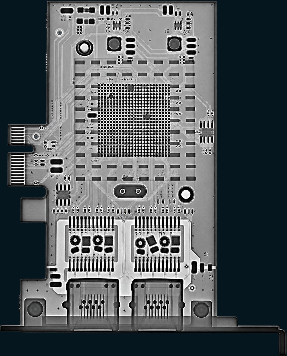 Full-field X-ray of the same assembled card, from edge connector to mounting bracket